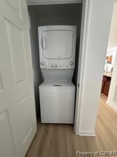 230 Roseneath Ave, Kilmarnock, VA 22482 - laundry area featuring estacked washer and dryer and wood finished floors