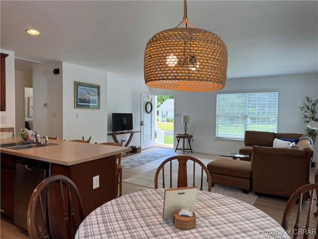 230 Roseneath Ave, Kilmarnock, VA 22482 - dining area with light wood-style floors, baseboards, and recessed lighting