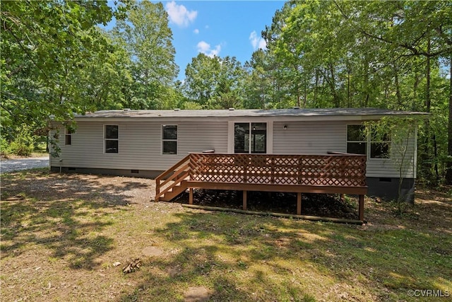 10780 Winchester Dr, Amelia Courthouse, VA 23002 - rear view of house featuring crawl space and a wooden deck