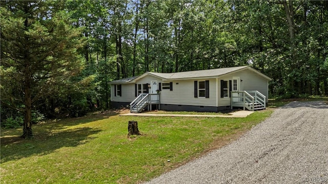 10780 Winchester Dr, Amelia Courthouse, VA 23002 - manufactured / mobile home with crawl space and a front lawn
