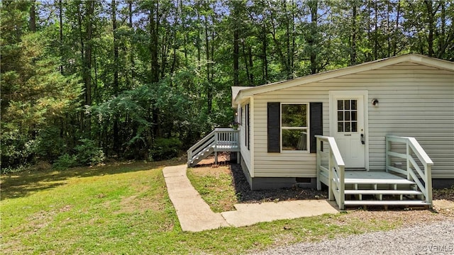 10780 Winchester Dr, Amelia Courthouse, VA 23002 - rear view of house featuring a lawn and crawl space