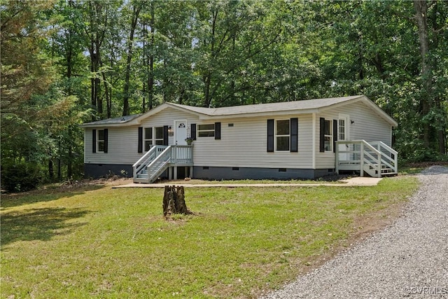 10780 Winchester Dr, Amelia Courthouse, VA 23002 - manufactured / mobile home with crawl space and a front lawn