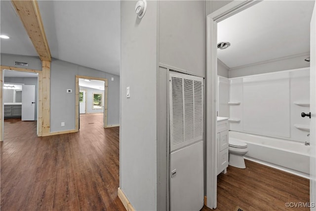 10780 Winchester Dr, Amelia Courthouse, VA 23002 - corridor featuring a heating unit, dark wood-style flooring, and beam ceiling