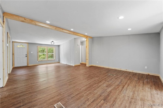 10780 Winchester Dr, Amelia Courthouse, VA 23002 - unfurnished living room with recessed lighting, wood finished floors, and beam ceiling