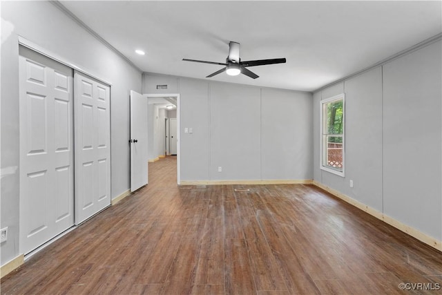 10780 Winchester Dr, Amelia Courthouse, VA 23002 - unfurnished bedroom with wood finished floors and ceiling fan