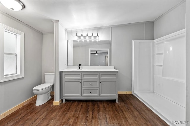 10780 Winchester Dr, Amelia Courthouse, VA 23002 - bathroom featuring vanity, wood finished floors, ceiling fan, and a shower