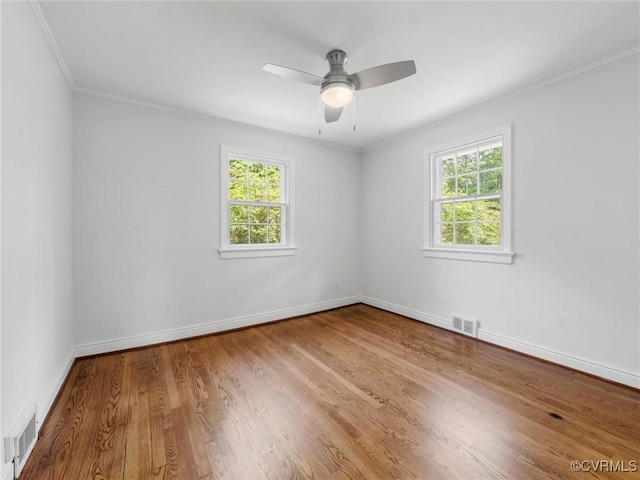 8525 Mark Lawn Dr, Henrico, VA 23229 - empty room featuring plenty of natural light, ornamental molding, wood finished floors, and ceiling fan