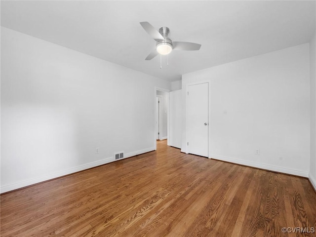 8525 Mark Lawn Dr, Henrico, VA 23229 - unfurnished bedroom with wood finished floors and ceiling fan