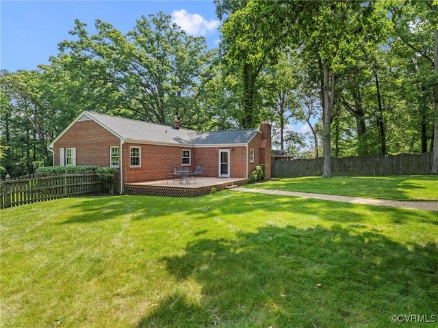 8525 Mark Lawn Dr, Henrico, VA 23229 - back of house with a fenced backyard, brick siding, a chimney, and a patio area