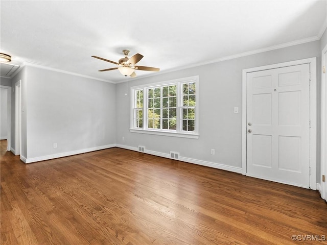 8525 Mark Lawn Dr, Henrico, VA 23229 - unfurnished living room with ornamental molding, ceiling fan, wood finished floors, and attic access