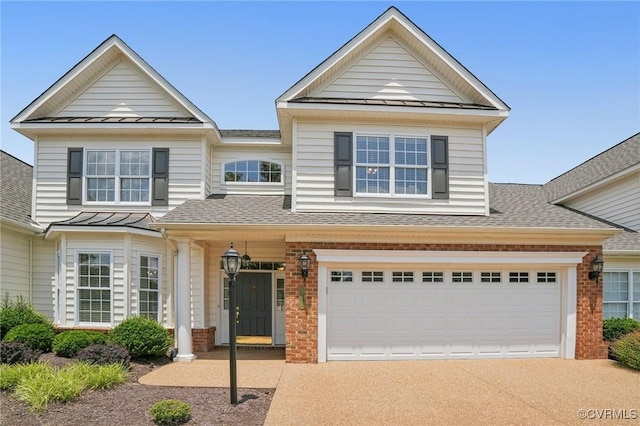 8156 Cool Summer Dr, Mechanicsville, VA 23111 - view of front facade with brick siding, a standing seam roof, concrete driveway, and a shingled roof