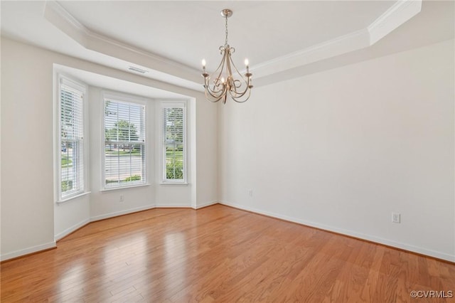 8156 Cool Summer Dr, Mechanicsville, VA 23111 - empty room featuring a chandelier, crown molding, light wood finished floors, and a tray ceiling