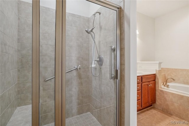 8156 Cool Summer Dr, Mechanicsville, VA 23111 - full bathroom with a shower stall, vanity, tile patterned floors, and a garden tub