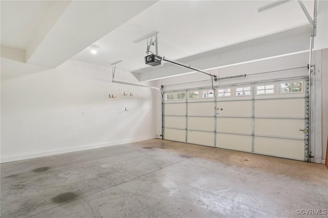 8156 Cool Summer Dr, Mechanicsville, VA 23111 - garage with a garage door opener and baseboards