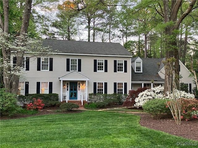 9606 Carterwood Rd, Henrico, VA 23229 - colonial house with a front lawn and a shingled roof