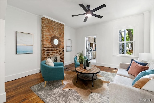 321 S Laurel St, Richmond, VA 23220 - living room featuring ornamental molding, hardwood / wood-style flooring, baseboards, a ceiling fan, and a fireplace