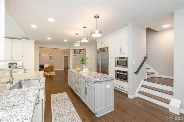 14006 Riverdowns N Mews, Midlothian, VA 23113 - kitchen with stainless steel appliances, a sink, white cabinetry, dark wood-style flooring, and recessed lighting