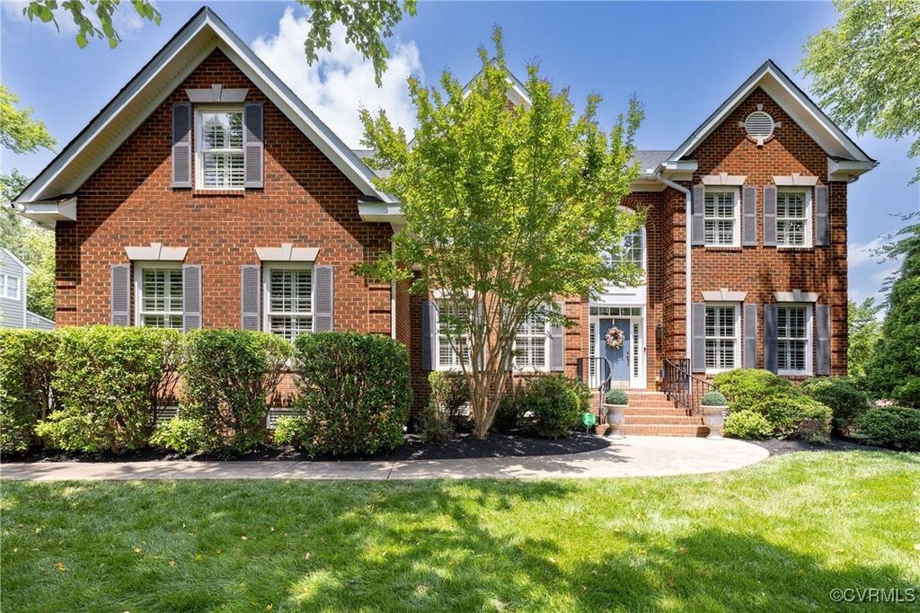 14006 Riverdowns N Mews, Midlothian, VA 23113 - georgian-style home featuring brick siding and a front yard