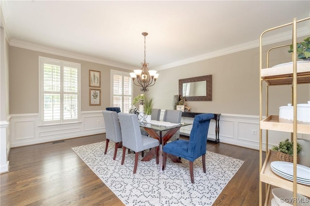 14006 Riverdowns N Mews, Midlothian, VA 23113 - dining room featuring a chandelier, ornamental molding, wainscoting, dark wood finished floors, and a decorative wall