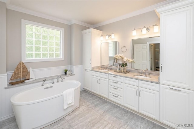 14006 Riverdowns N Mews, Midlothian, VA 23113 - bathroom with double vanity, a freestanding tub, and crown molding