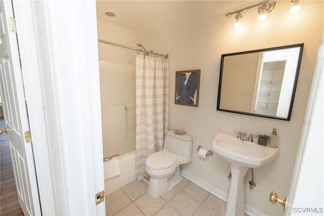 14006 Riverdowns N Mews, Midlothian, VA 23113 - full bathroom featuring tile patterned floors, toilet, baseboards, shower / tub combo with curtain, and vaulted ceiling