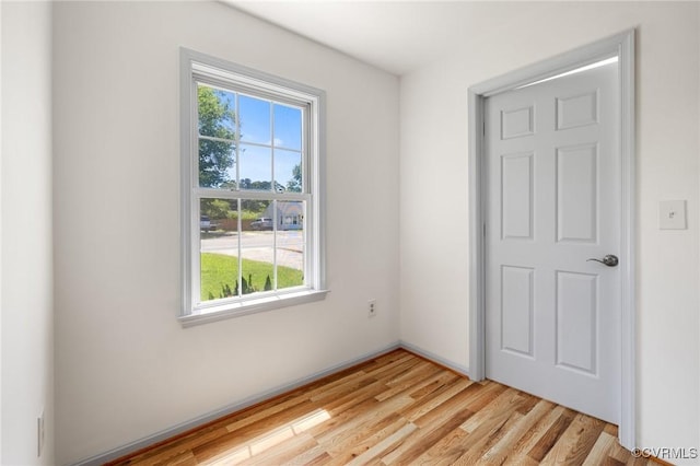 1312 St Michaels Ln, Richmond, VA 23229 - empty room with healthy amount of natural light and light wood-type flooring