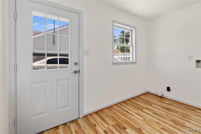 1312 St Michaels Ln, Richmond, VA 23229 - washroom with light wood-style floors and baseboards
