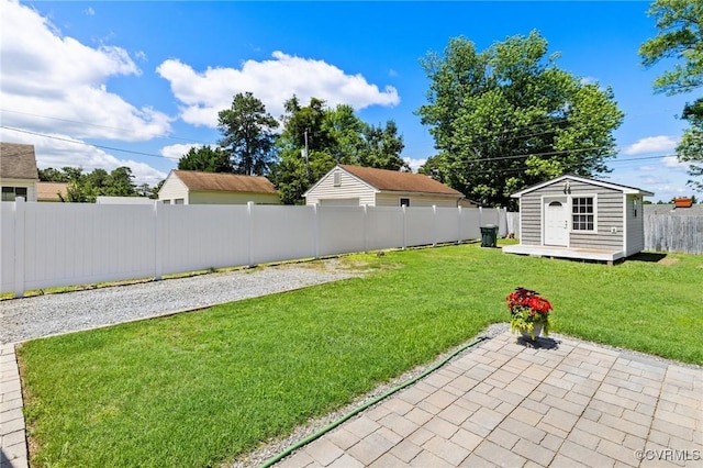 1312 St Michaels Ln, Richmond, VA 23229 - fenced backyard featuring a patio area and a storage unit
