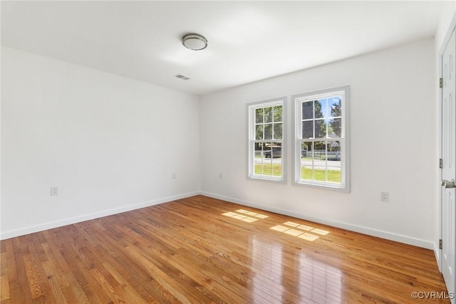 1312 St Michaels Ln, Richmond, VA 23229 - unfurnished room featuring hardwood / wood-style floors and baseboards