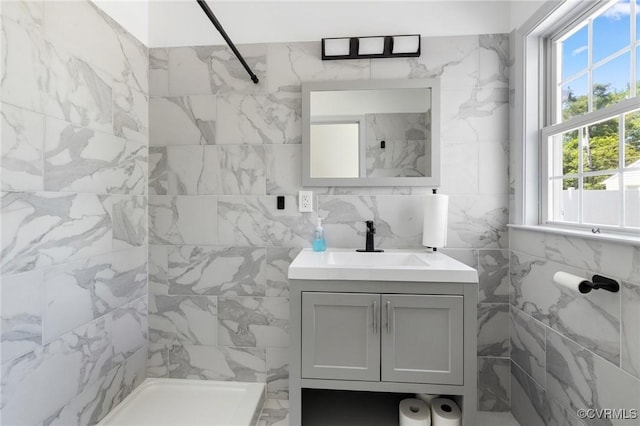 1312 St Michaels Ln, Richmond, VA 23229 - bathroom with plenty of natural light, vanity, and tiled shower
