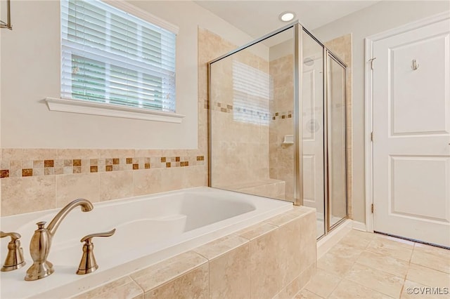 9951 Orchard Meadow Rd, Mechanicsville, VA 23116 - bathroom with a stall shower, a bath, and tile patterned floors