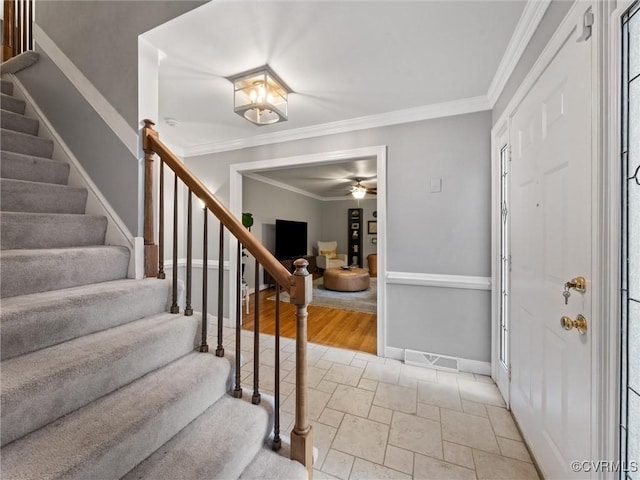 1125 Royal Ridge Rd, Chesterfield, VA 23114 - foyer entrance featuring crown molding, stairs, a ceiling fan, and stone tile floors