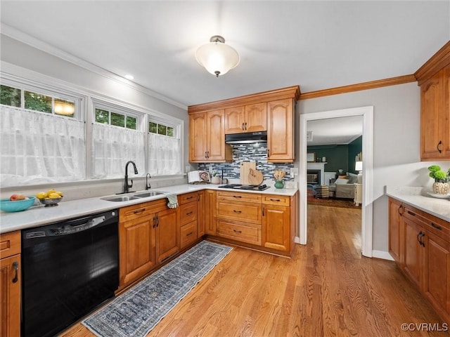1125 Royal Ridge Rd, Chesterfield, VA 23114 - kitchen featuring dishwasher, under cabinet range hood, light wood-style flooring, ornamental molding, and light countertops