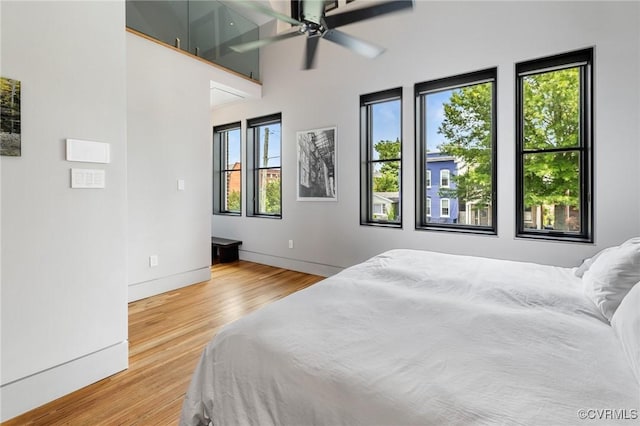 114 S Colonial Ave, Richmond, VA 23221 - bedroom featuring wood finished floors, multiple windows, and a ceiling fan