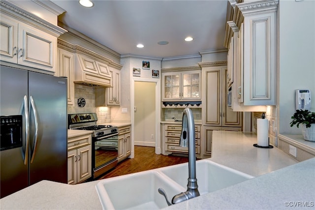 2520 Nathaniell Powell Rd, Williamsburg, VA 23185 - kitchen with stainless steel appliances, cream cabinetry, light countertops, backsplash, and recessed lighting