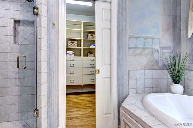 2520 Nathaniell Powell Rd, Williamsburg, VA 23185 - bathroom featuring a stall shower and wood finished floors