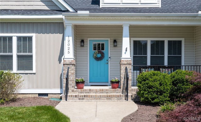 12025 Autumn Knoll Dr, Mechanicsville, VA 23116 - property entrance featuring a shingled roof, covered porch, and board and batten siding