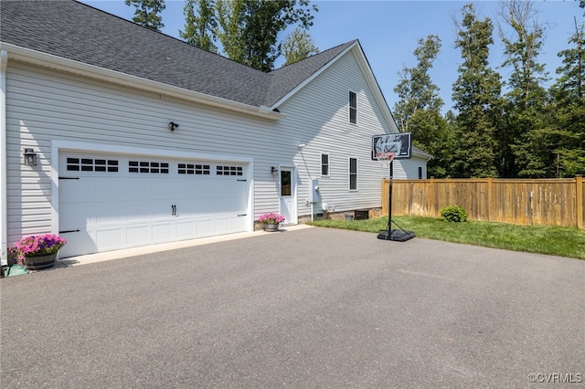 12025 Autumn Knoll Dr, Mechanicsville, VA 23116 - view of home's exterior featuring a shingled roof, a garage, and driveway