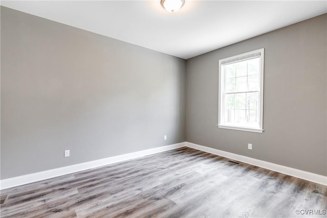 8315 Namozine Rd, Amelia Courthouse, VA 23002 - empty room with wood finished floors and baseboards