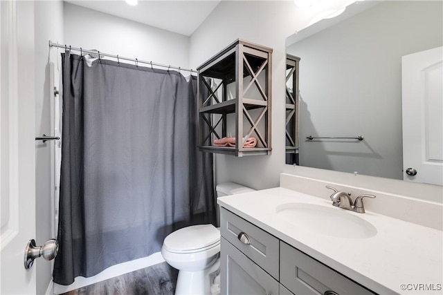 8315 Namozine Rd, Amelia Courthouse, VA 23002 - bathroom featuring vanity, toilet, shower / tub combo, and wood finished floors