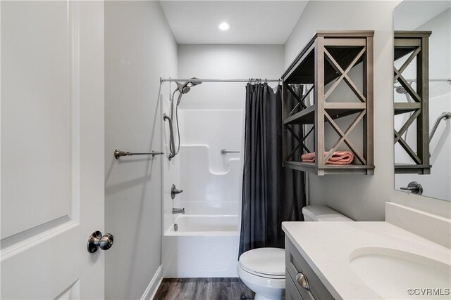 8315 Namozine Rd, Amelia Courthouse, VA 23002 - full bathroom featuring toilet, vanity, wood finished floors, and shower / bathtub combination with curtain