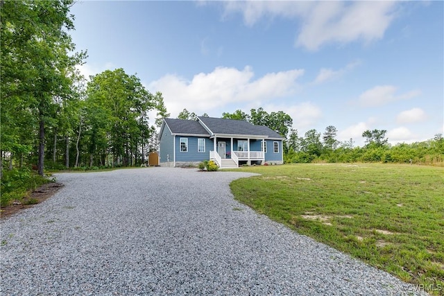 8315 Namozine Rd, Amelia Courthouse, VA 23002 - view of front of home with gravel driveway, a porch, and a front lawn