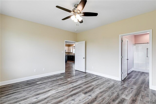 8315 Namozine Rd, Amelia Courthouse, VA 23002 - unfurnished bedroom with wood finished floors, baseboards, and a ceiling fan