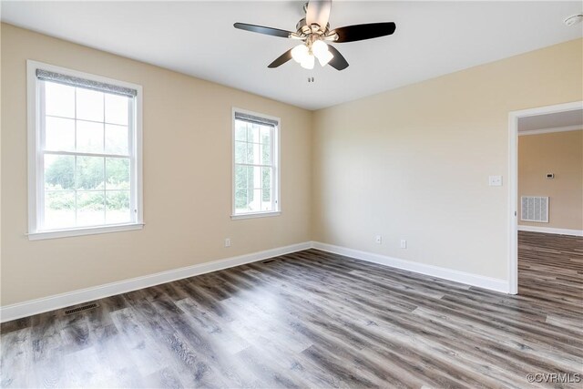 8315 Namozine Rd, Amelia Courthouse, VA 23002 - empty room with wood finished floors, baseboards, and ceiling fan