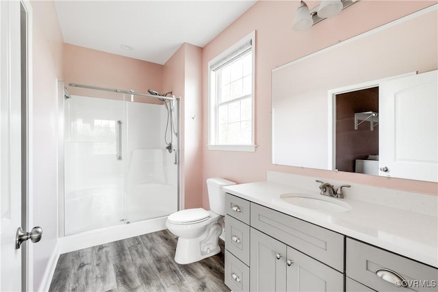 8315 Namozine Rd, Amelia Courthouse, VA 23002 - bathroom featuring a stall shower, toilet, vanity, and wood finished floors