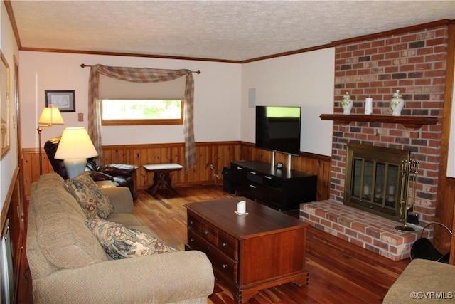 8318 Banshire Ct, Hanover, VA 23111 - living area with wood-type flooring, a wainscoted wall, a textured ceiling, wood walls, and crown molding