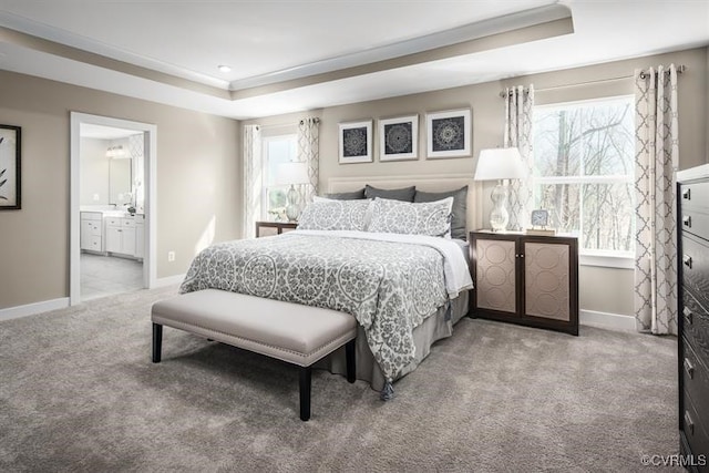 14413 Reisen Ln, Chester, VA 23831 - carpeted bedroom with a tray ceiling, multiple windows, and baseboards