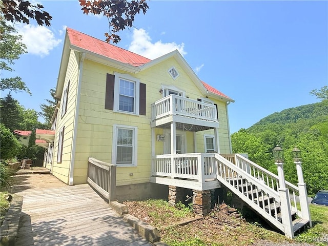 12509 Sam Snead Hwy, Warm Springs, VA 24484 - view of front of home with a balcony and metal roof
