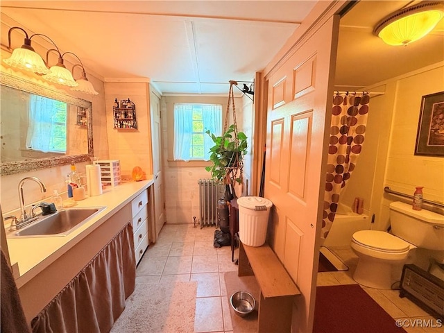 12509 Sam Snead Hwy, Warm Springs, VA 24484 - bathroom featuring radiator, vanity, toilet, tile patterned flooring, and shower / bath combination with curtain