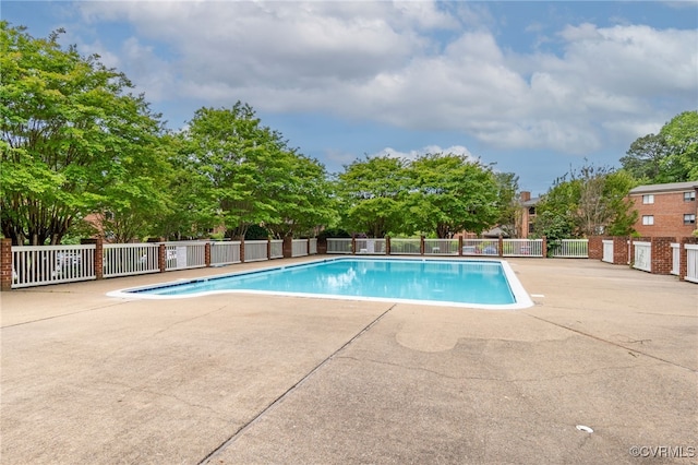 2106 Turtle Run Dr Unit 3, Henrico, VA 23233 - community pool with a patio area and view of scattered trees